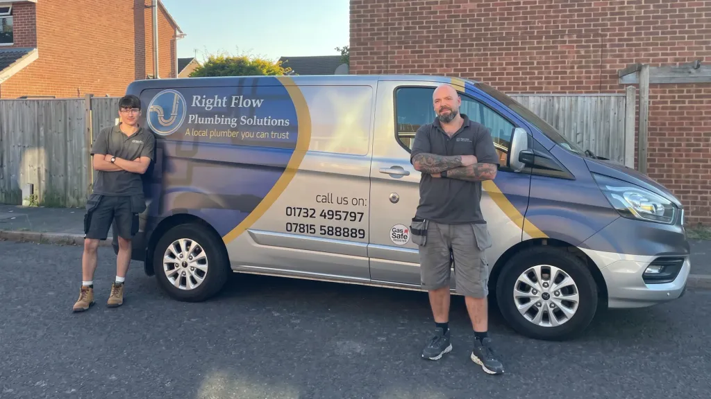 The Right Flow Plumbing Solutions team with their branded van